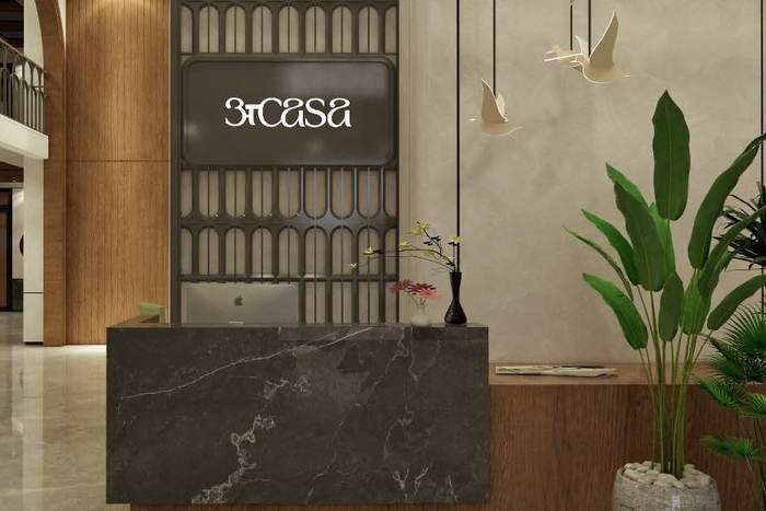 Double height reception desk in the Acasa clubhouse