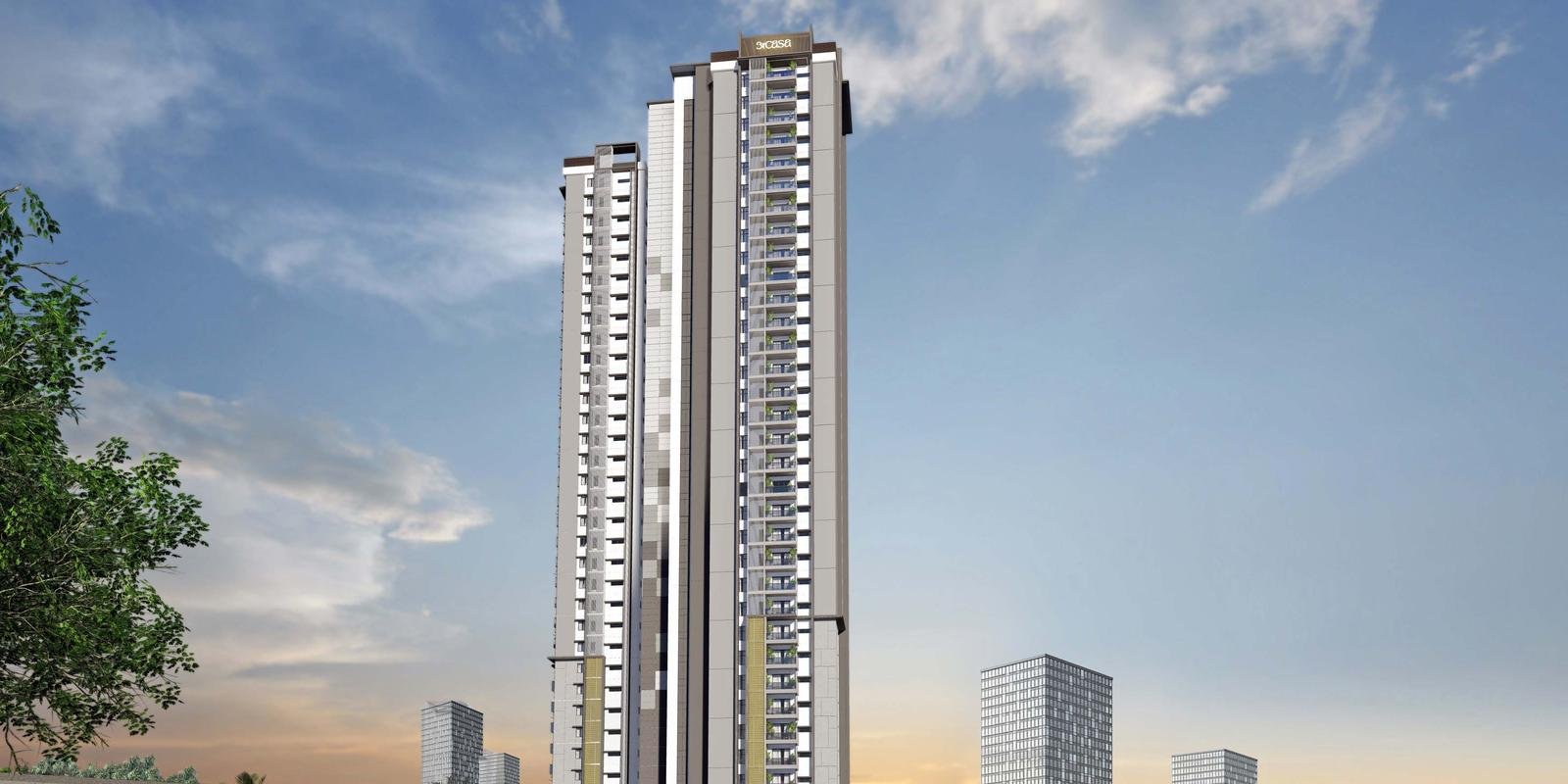 Acasa by Simchah Estates, the Kokapet tower at dusk with the Hyderabad skyline behind it