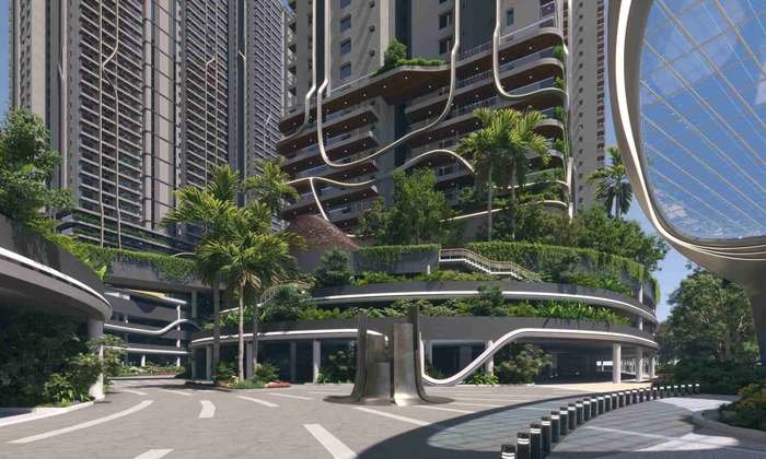 Grande entrance plaza at Fortune Suraj Bhan Grandé with the double-height drop-off and landscaped podium edge